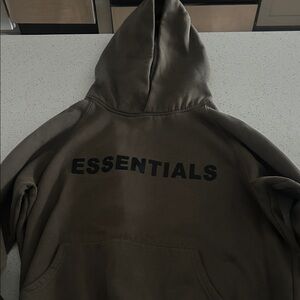 Fear of God Essentials Sweatshirt in Olive